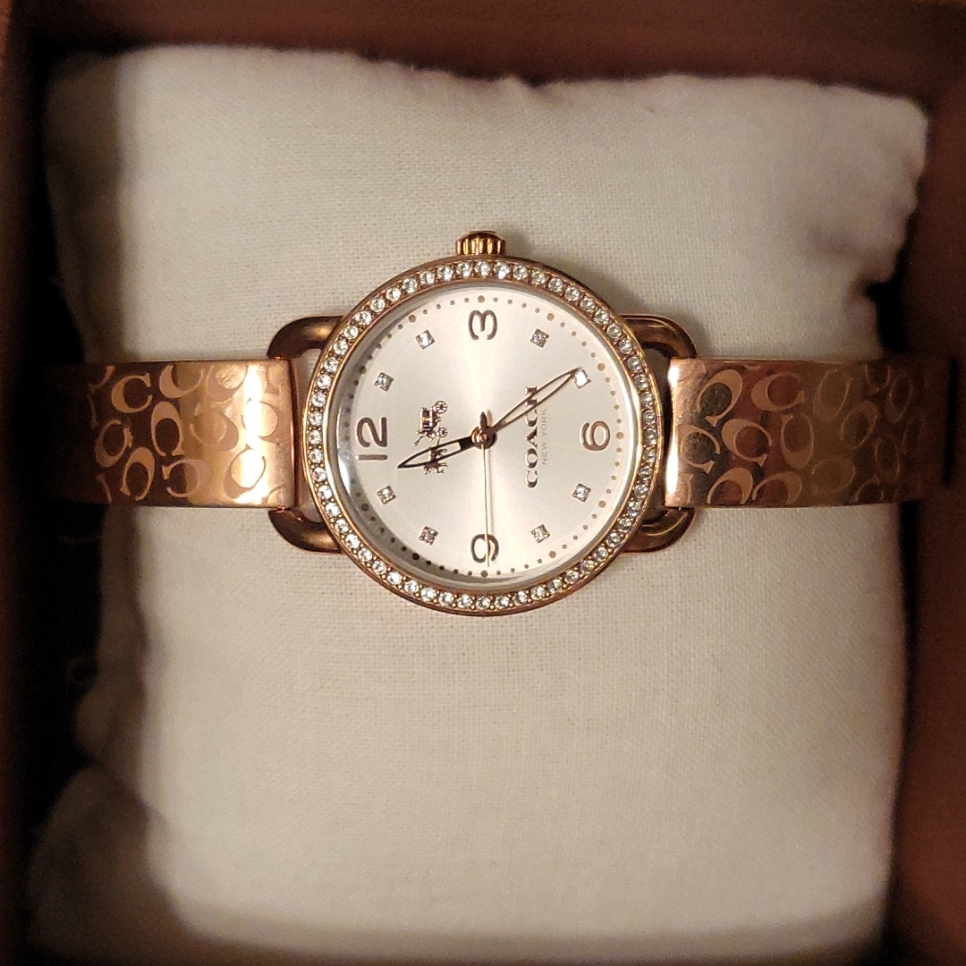 Ladies Coach Crysyal Accent Pink Gold Tone Bangle Watch